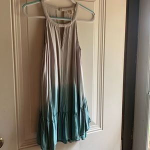 Woman’s sleeveless ombré sun dress.